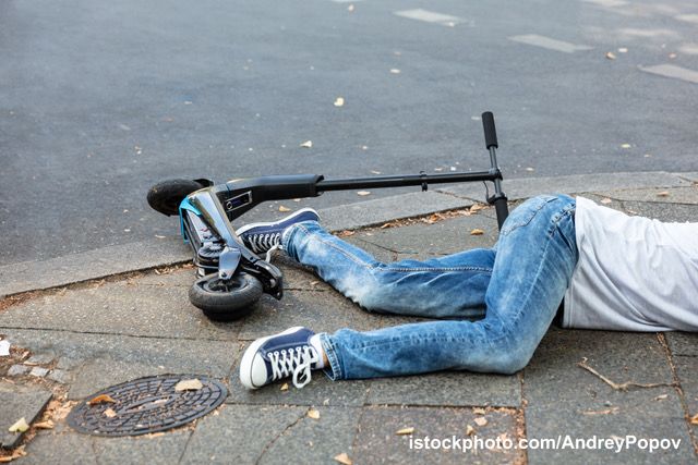 Unconscious Man Lying On Street After Accident Electric Scooter